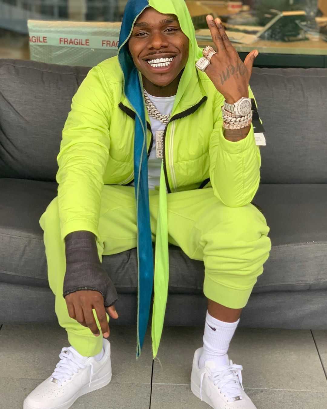Download Dababy In Teal Jacket Outfit Wallpaper